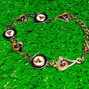 Rams Officially Licensed NFL Stainless Steal Bracelet.  Adjustable size to 10in